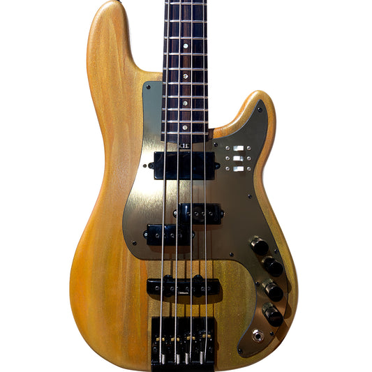 Wooden electric bass guitar on a white background