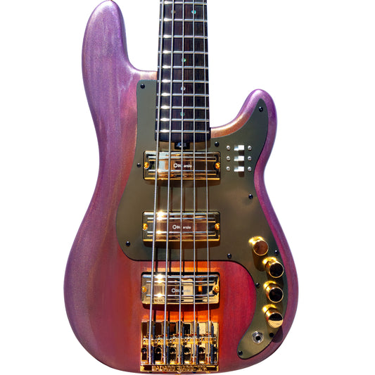 Purple electric bass guitar on a white background